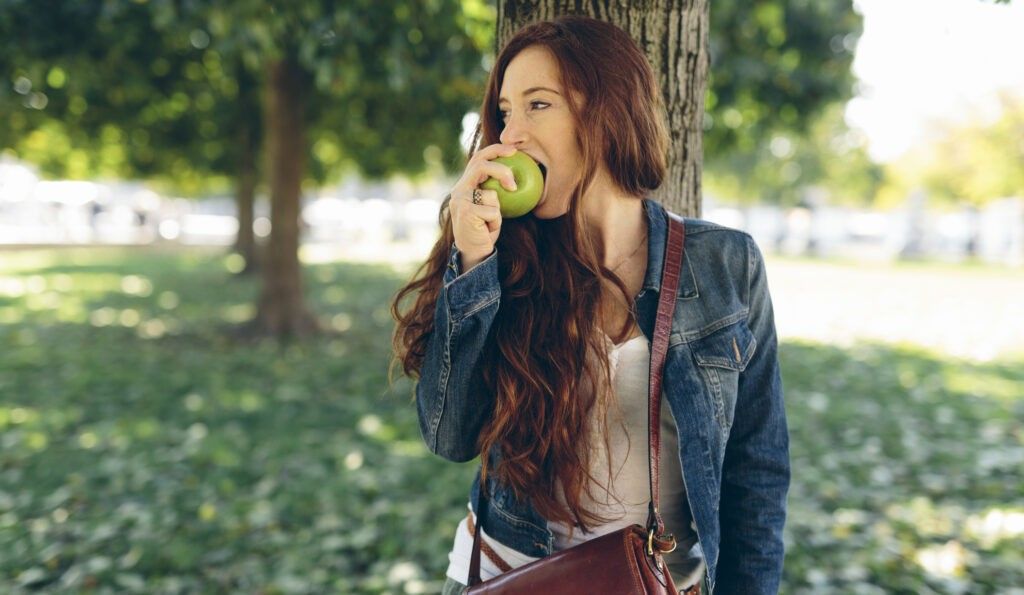 woman eating an apple