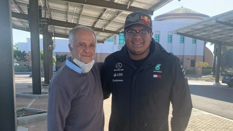 a younger man with an older man