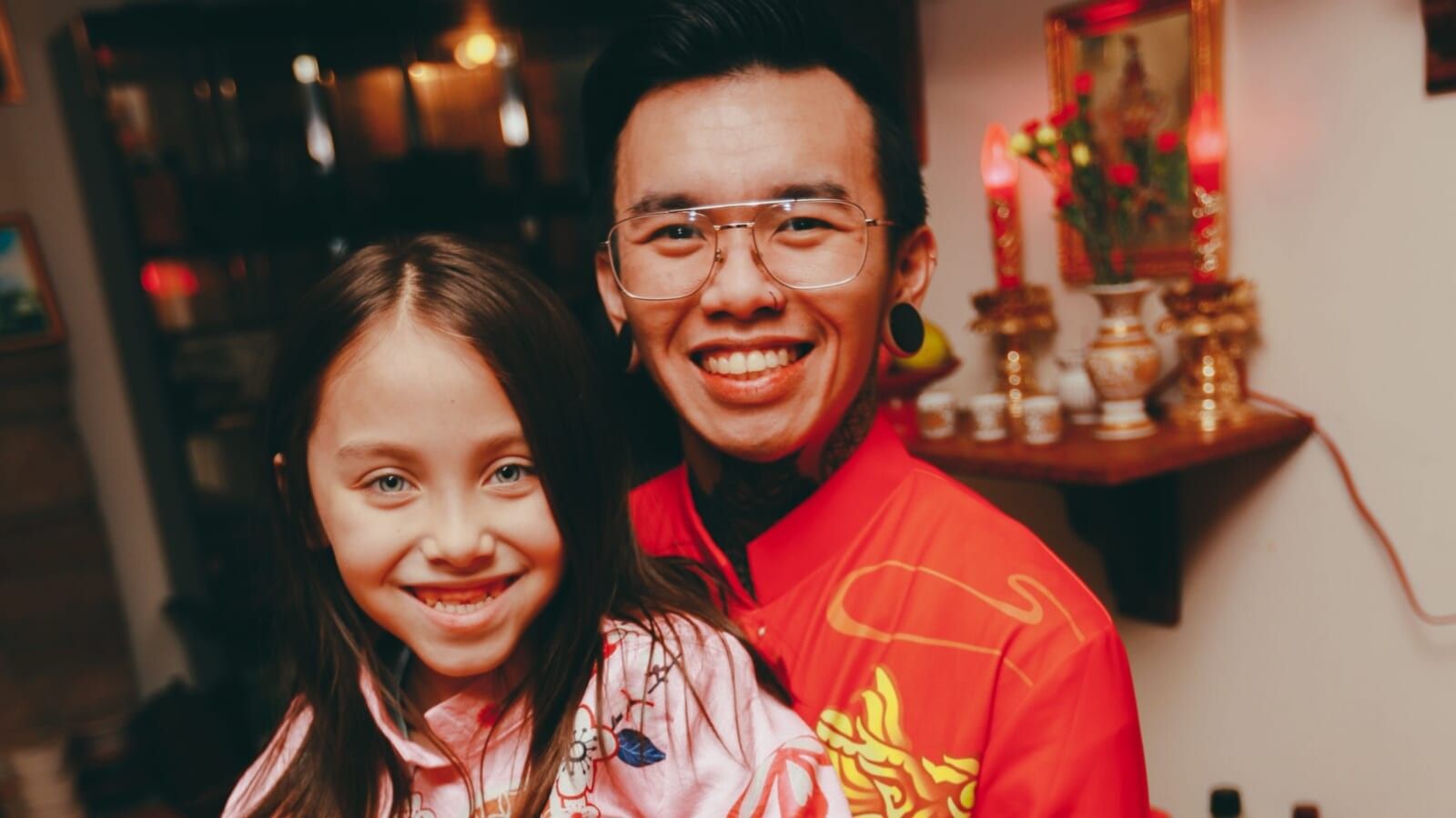 brother and sister smiling