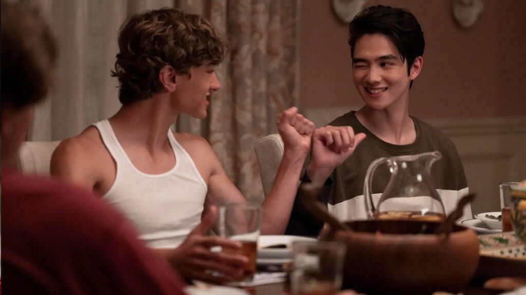 the summer I turned pretty conrad dinner table fist bump