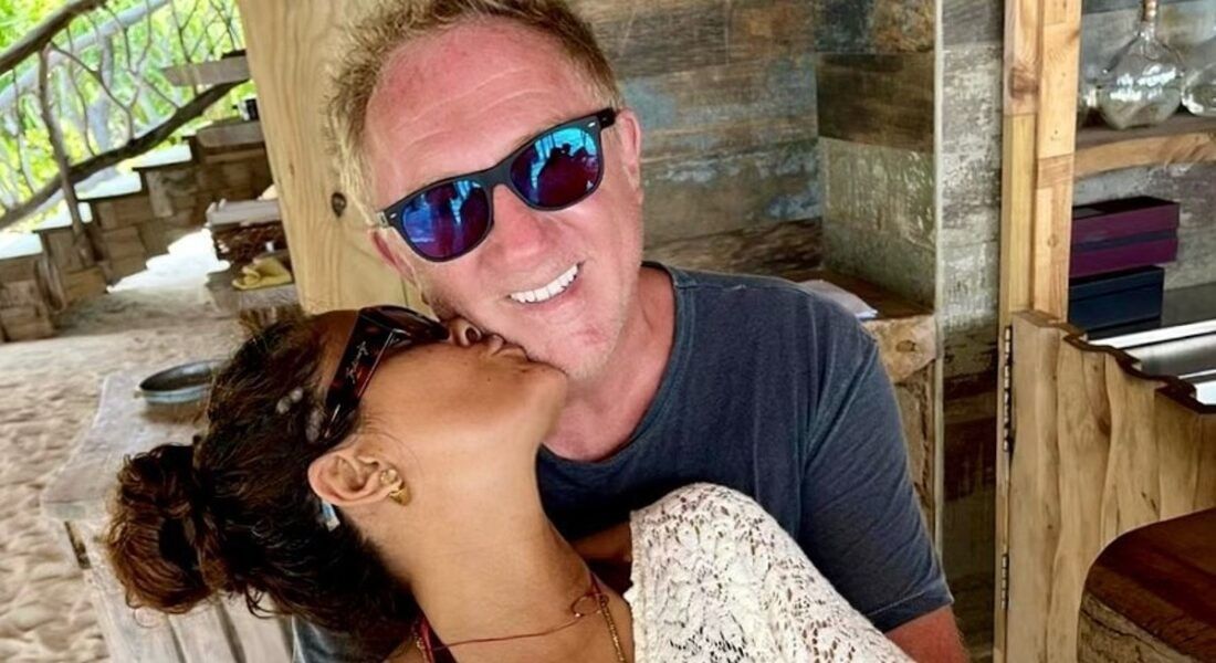 Actress Salma Hayek and husband Francois-Henri Pinault kissing and celebrating their anniversary.