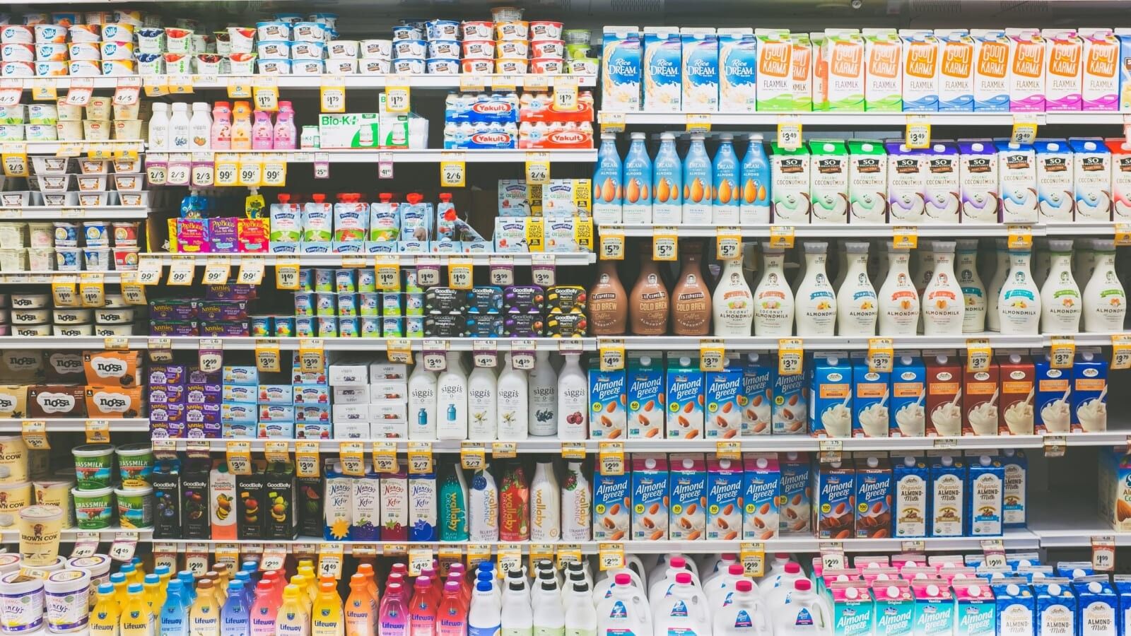 various drinks stocked on a grocery store shelf