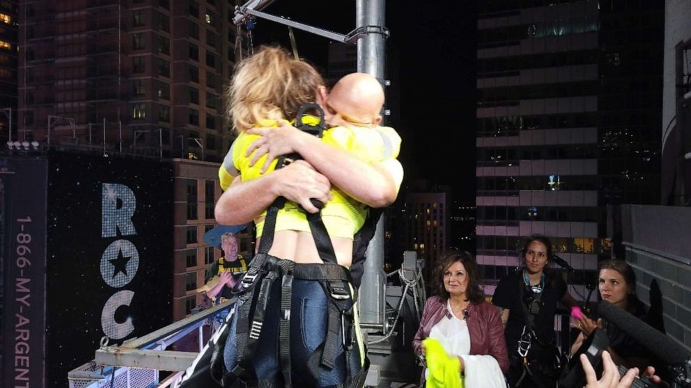 Brother and Sister Conquer Their Fears to Tightrope Walk Across Times Square Together