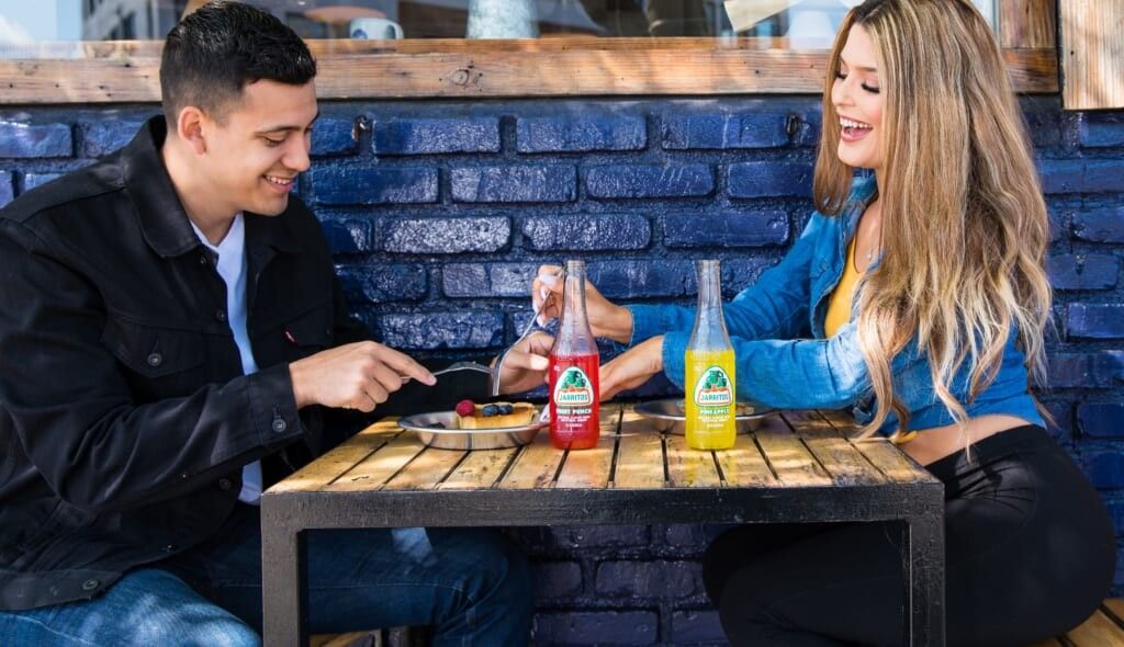 couple flirting at a table at a restaurant