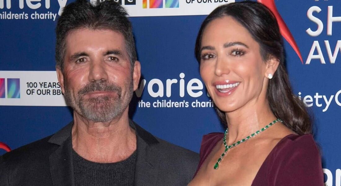 Simon cowell and wife Laura Silverman on the red carpet.