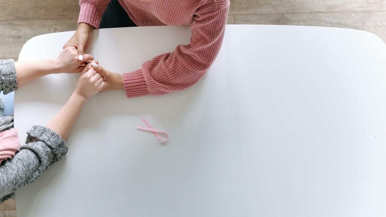 two people holding hands