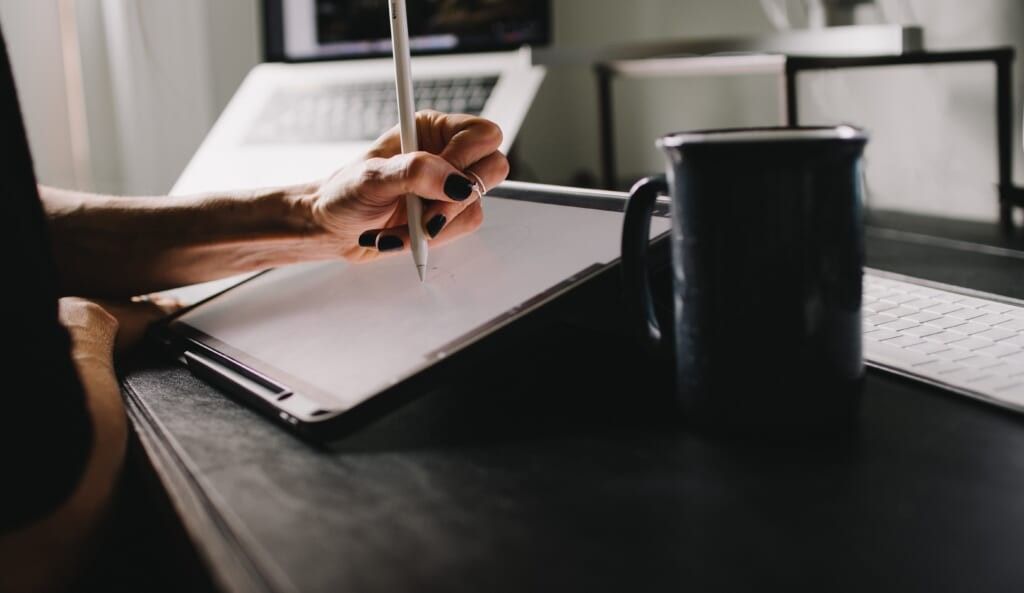 hand in a state of creation