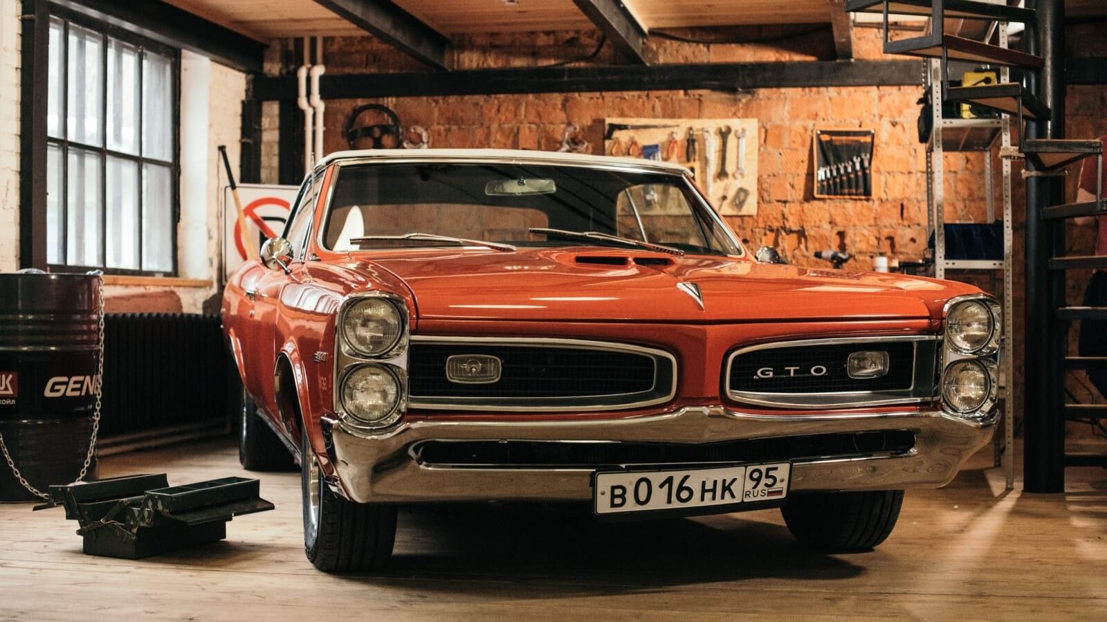 orange car in a garage