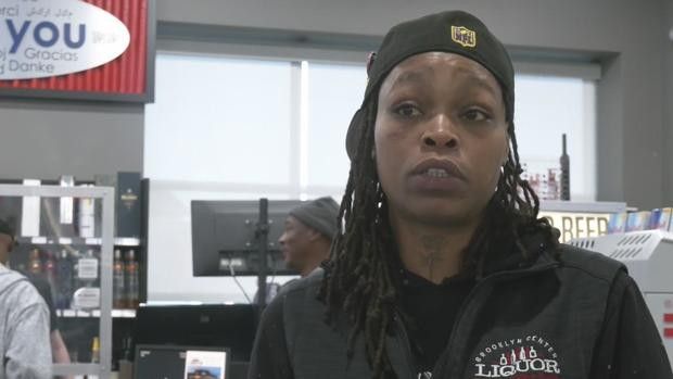 woman wearing black clothes and a black hat