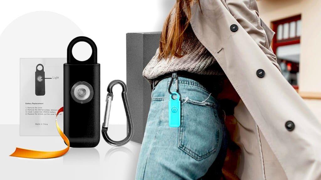Thopeb Alarm Keychain product display in black and a blue model on a woman