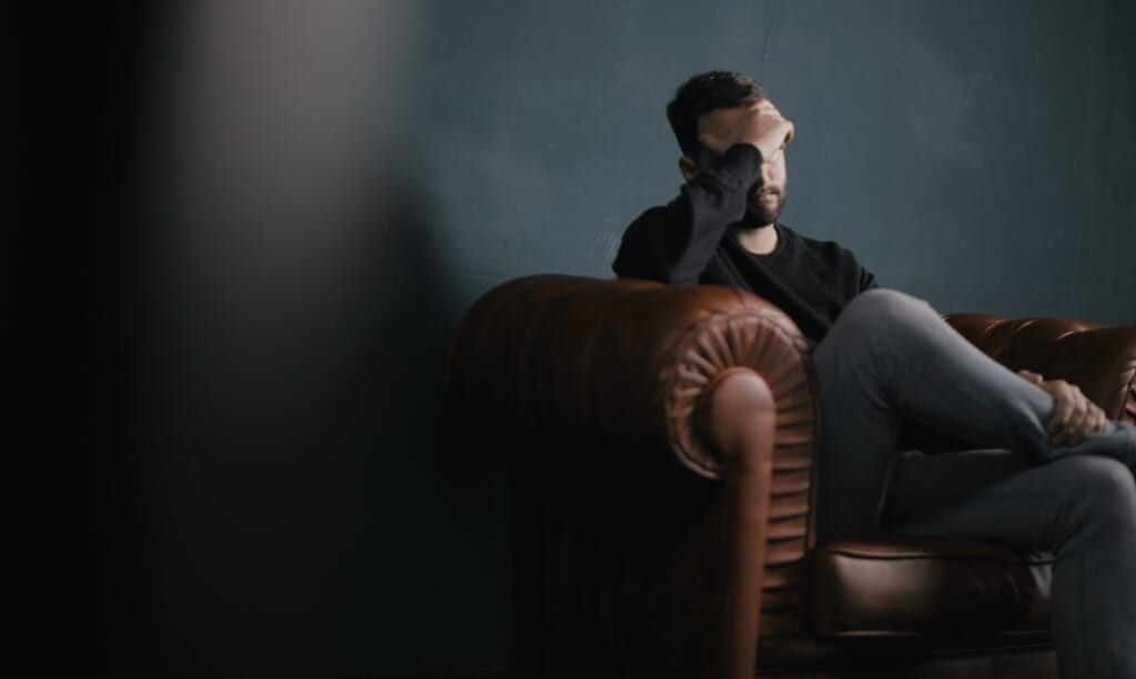 young man faces his mental illness head on