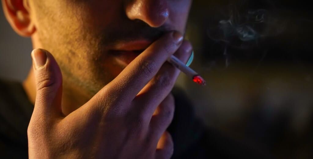 drug addiction man with joint